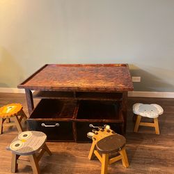 Wooden art table with wooden animals chairs