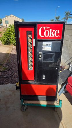 1970s Used Cavalier Coke vending machine.