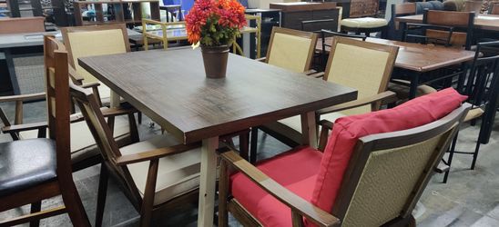 New chair set 1 chair doesn't have cushions sits 6 table has some cosmetic damage