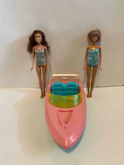 Barbie boat and two dolls