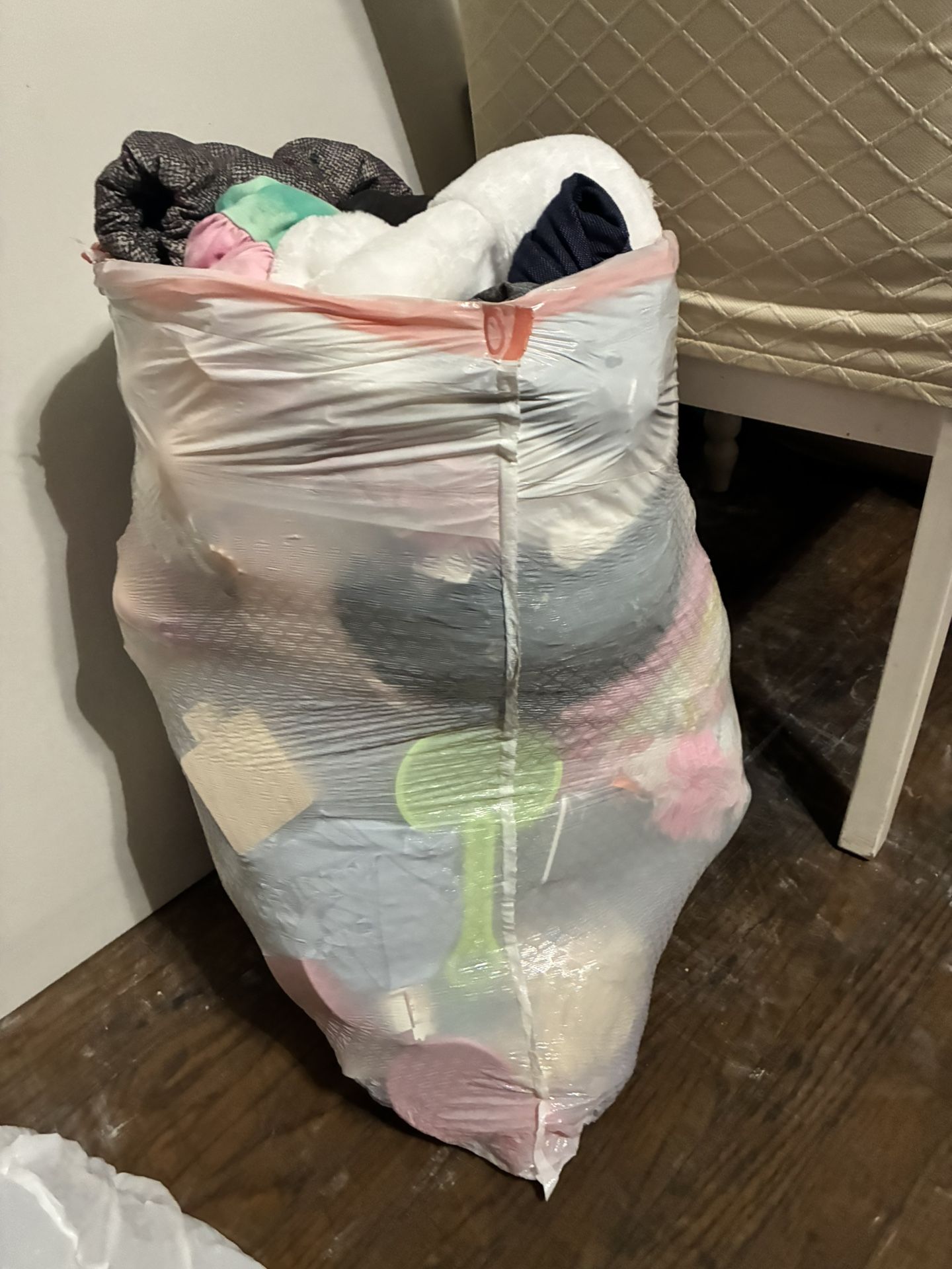 Bag Full Of Toys And Clothes