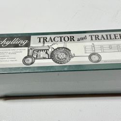 Antique (NEW) - Schylling Tractor and Trailer wind-up tin toy