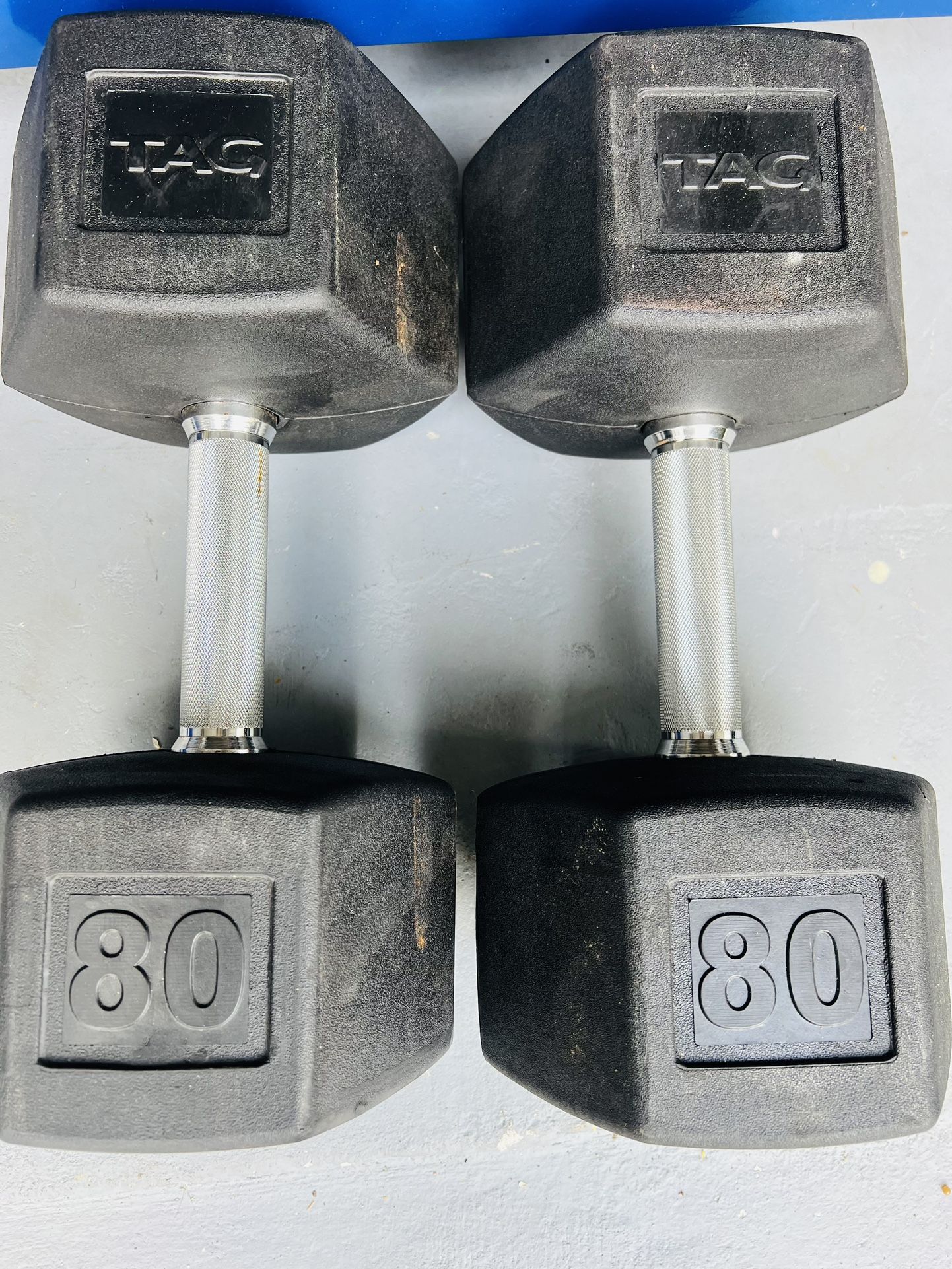 Grown Man Set Of 80 Lbs TAG Dumbbells