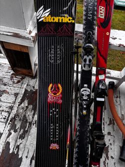 2 Skis And Snowboard