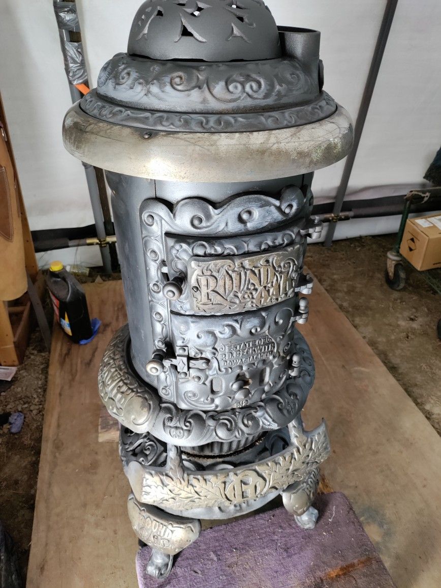 Antique Round Oak Pot Belly Stove