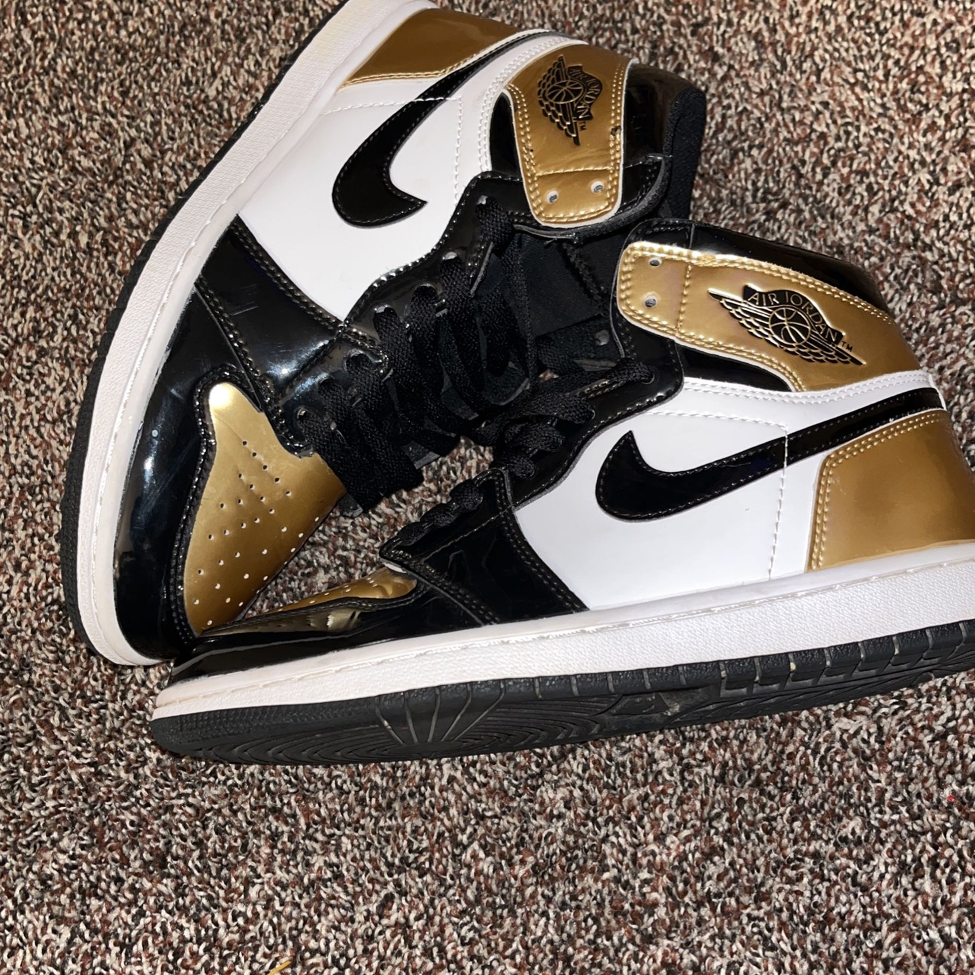 Gold And Black Jordan 1s