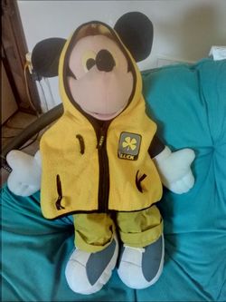 Mickey mouse with yellow hoody and khaki pants with Velcro and zippers