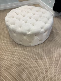Tufted velvet ottoman