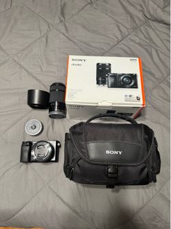Sony Alpha a6000 Mirrorless Digital Camera w/ 16-50mm and 55-210mm Power Zoom Lenses. Black