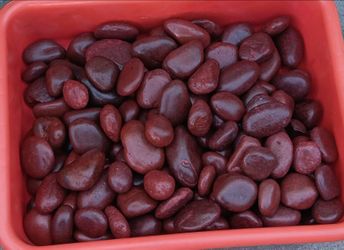 2"-3" Red Polish pebbles, 40lb bags.