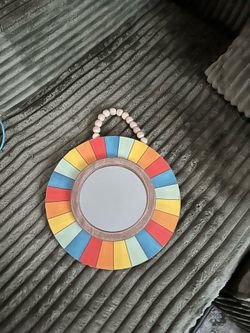 Hanging small mirror