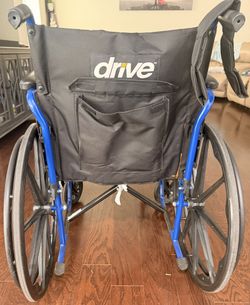 Blue Wheelchair Drive With Cushioned Arm Rest