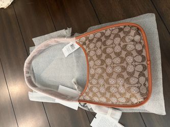 Coach crystal curve zip