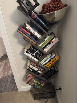 Gray book stand with drawer