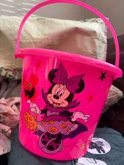 Trading 2 pink Minnie candy buckets for 2 orange!