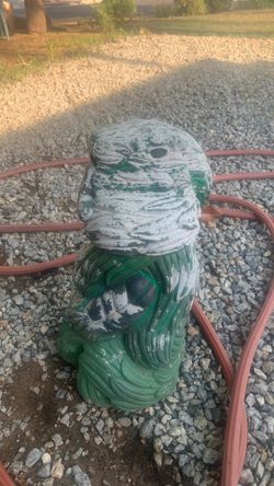 Ancient Aztec feather serpent god statue
