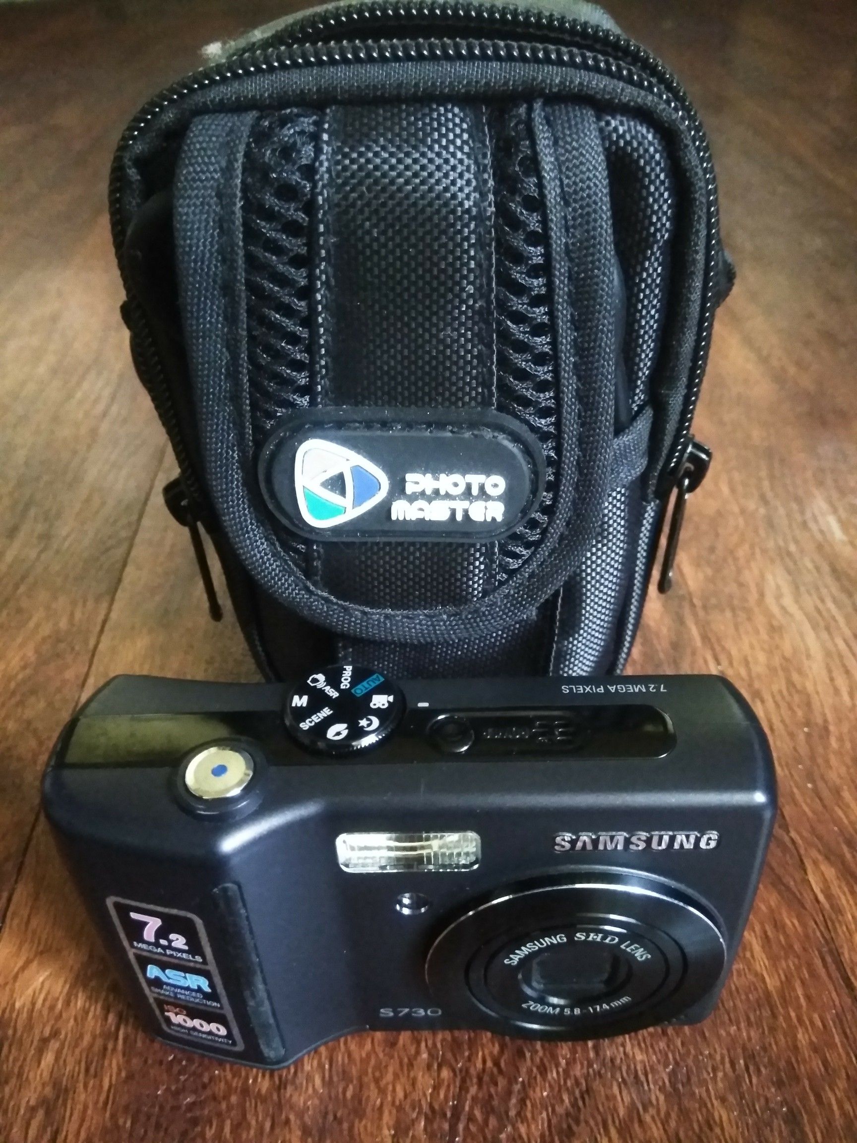 Camera and case. No charge cable works on AA batteries