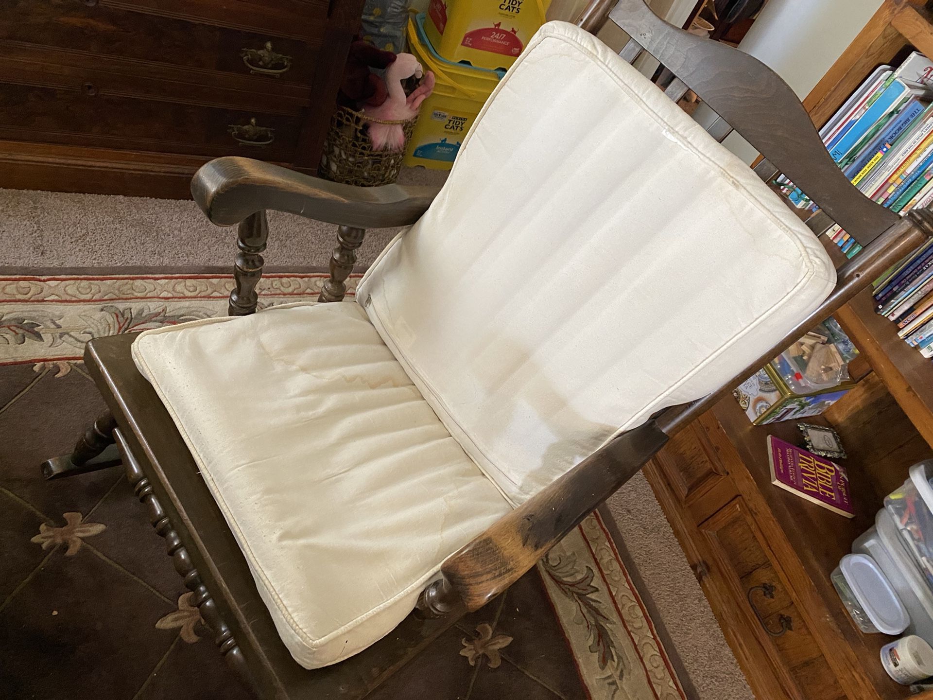 Rocking chair with cushion.