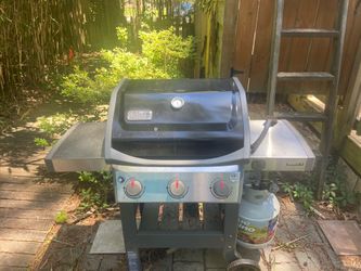 Weber gas grill w/propane tank