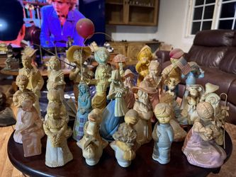 Collectible Avon perfume bottle figurines