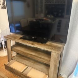 55” Samsung TV And Rustic Solid Wood Stand