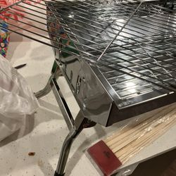 Brand New Foldable BBQ Grill With Sticks And All Useful Items