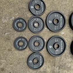 Olympic Weight Set 165 Lbs + Free Bar