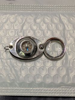 Vintage 
Made In occupied Japan 
Testrite pocket Compass 
with Loupe Magnifying Glass