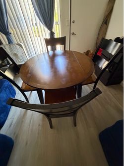 Dining Set: Wooden Table with expandable flaps and Chairs