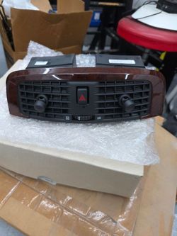 2003 to 2007 Cadillac CTS wood grain original AC vent cover,. NEW