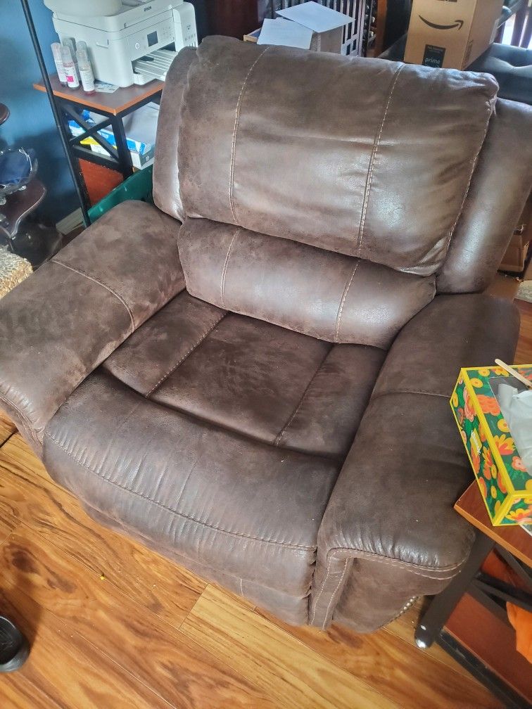 Brown Plug In Recliner 