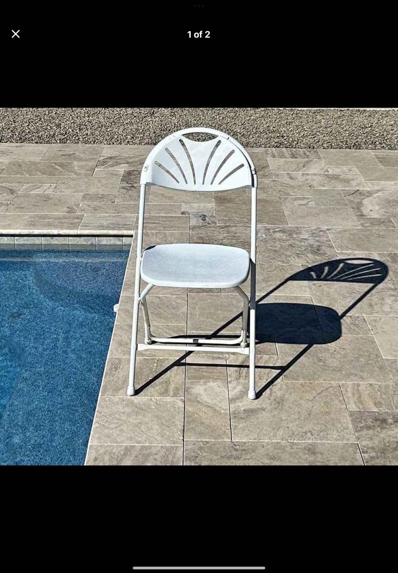 Folding white chairs .. very good shape.
