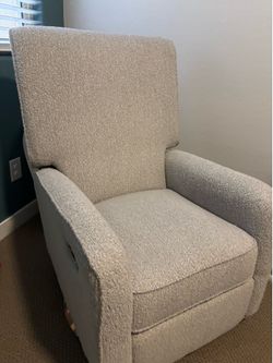 Reclining swivel rocking chair