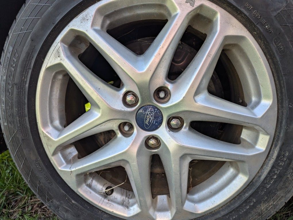 Set Of Rims Off A 2013 Ford Fusion (Tires are bad)