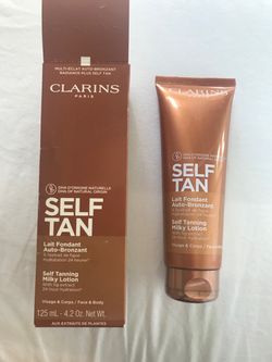 Clarins self tanning milky lotion - new in box, sealed