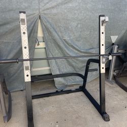 Weight Rack.  / Bar.         60 Dollars 