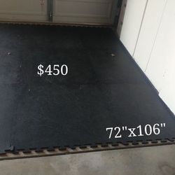 Rubber puzzle mats, ~3x3', 3/8" $50 per piece.