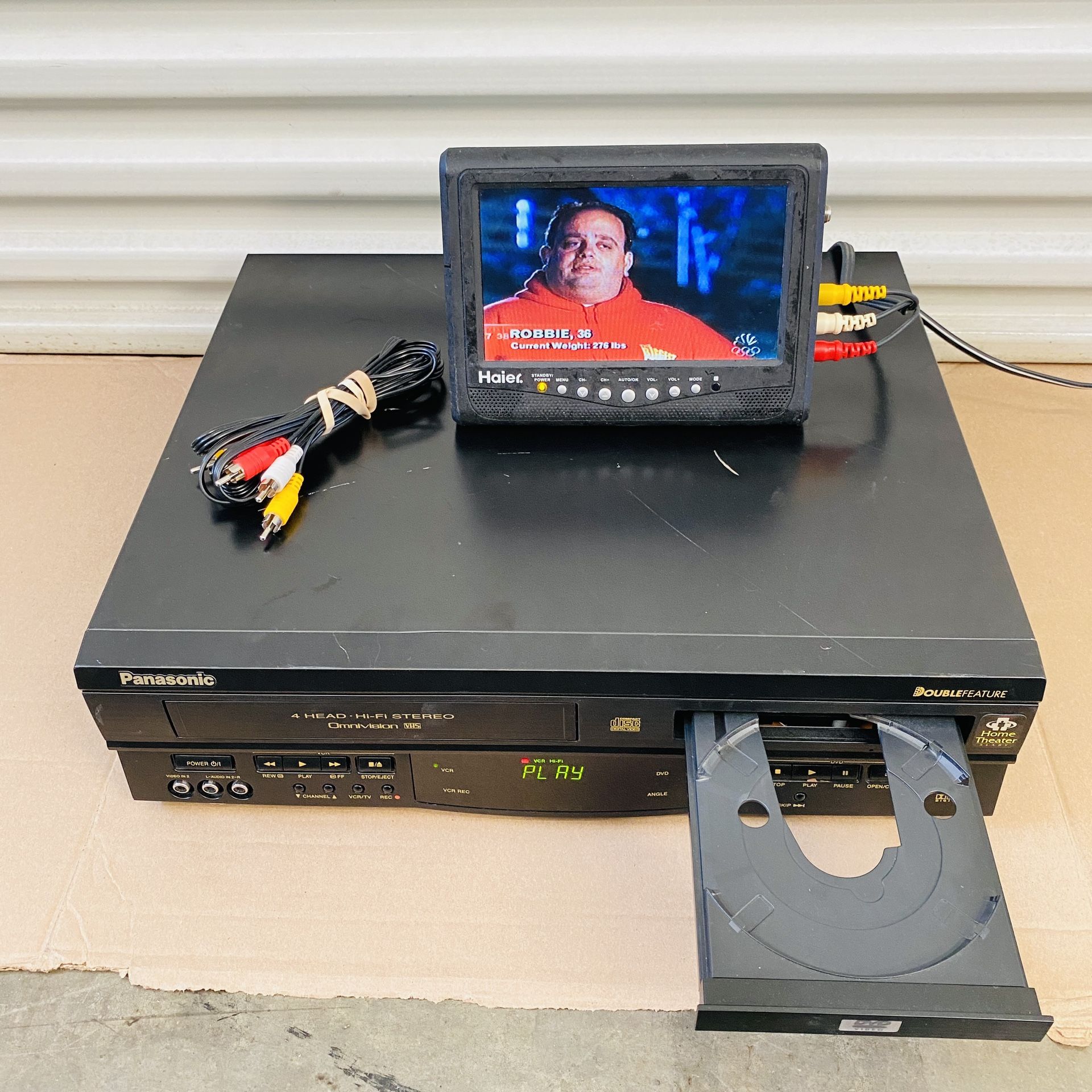 Panasonic PV-D4732 Double Feature VCR/DVD Combo Player Recorder W/ AV Cable. Tested and works great. Comes with AV TV connection  cable. Great conditi