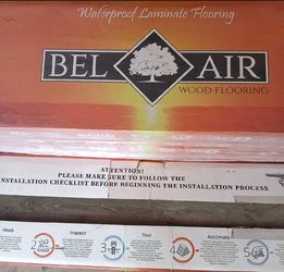 Brand new 6 boxes waterproof laminate wood flooring each box has 6 pieces measurements in pictures