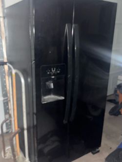 Refrigerator new just a little scratched up but fixable