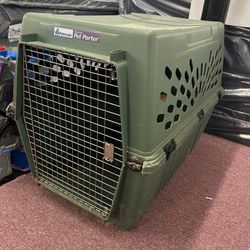 Used medium to large size Dog Crate 