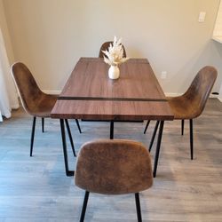 Brown Table and 4 Brown Faux Leather Chairs