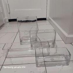 SET OF 4 CLEAR GLASS VASES 