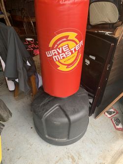 Wave master punching bag and kicking bag-adjustable brand new condition -Retails for $150