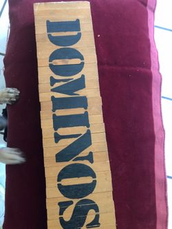 Wooden dominos. It measures about 16-1/2” x 4”. Each individual one measures 4”x 1/2”.