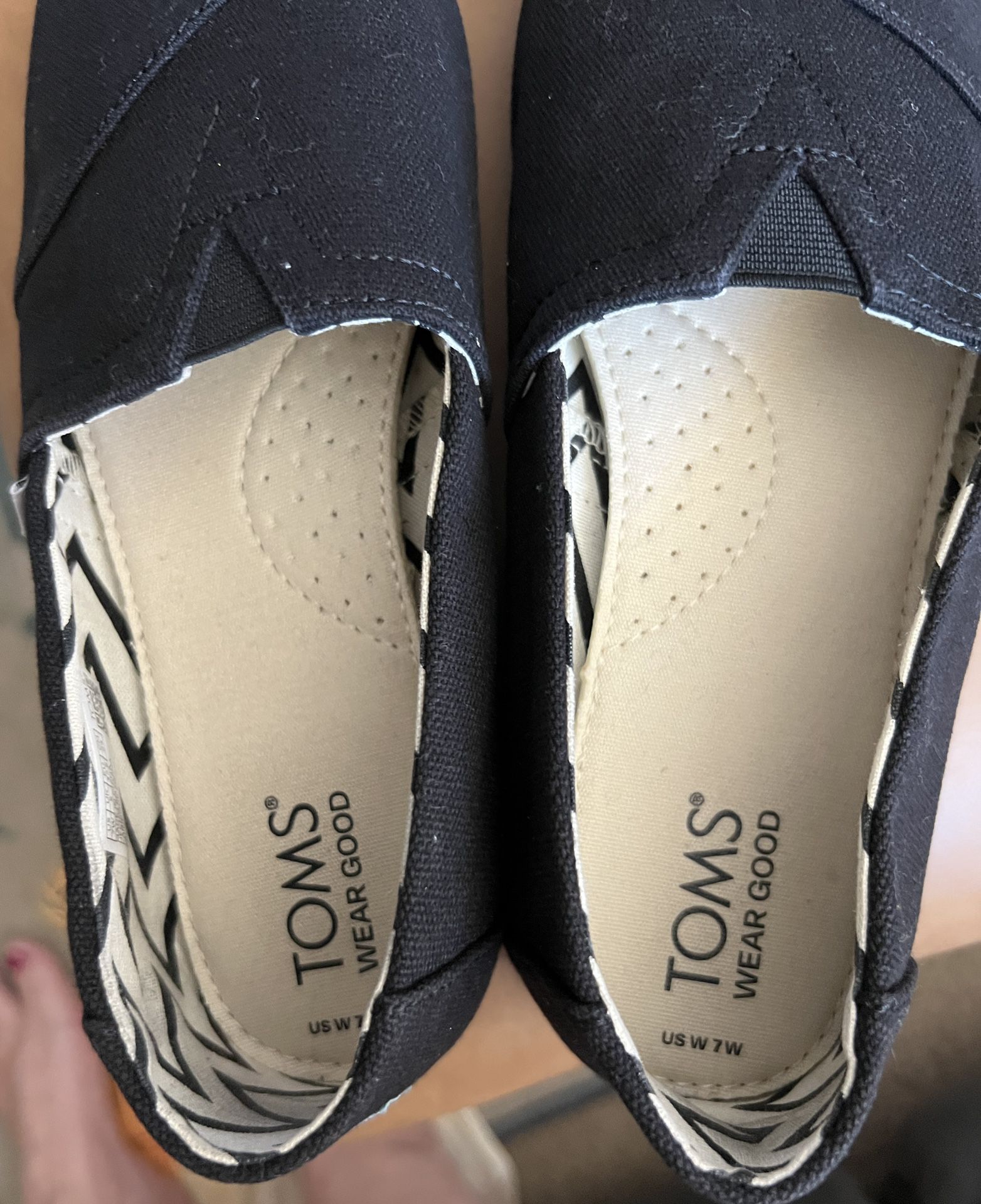 Tom’s Black Slip Ons  Size 7 Almost New