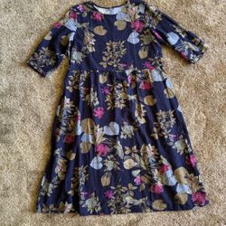 Black midi dress with floral pattern and 3/4 sleeves; perfect condition