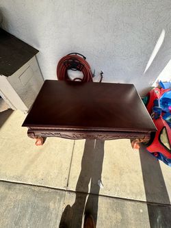 Dark Wood Coffee Table with Carved Detail