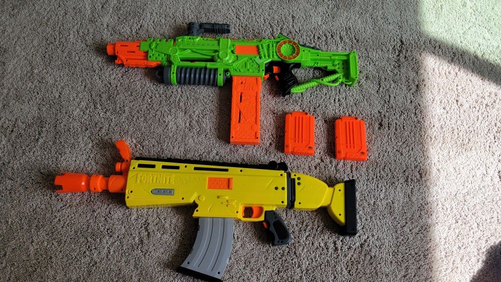 2 Nerf Guns With Darts