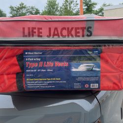 West marine four pack life jackets never used